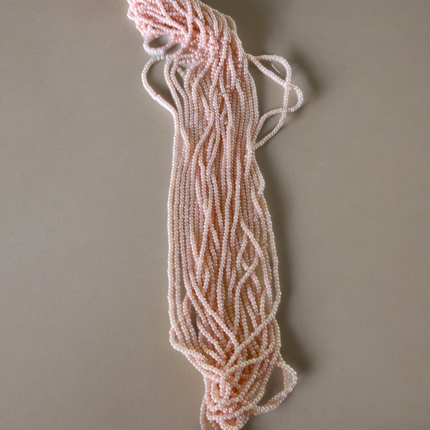 Czech  12 Strand Hank 11/0 Light Pink Peach Ceylon
